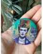 Badge God saves Frida